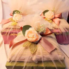 A warm welcome for your wedding guests. These beautifully wrapped room hampers are a small token of gratitude, filled with goodies to make their stay comfortable and let them know you appreciate them being there.
