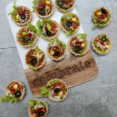 Our bite-sized Tex-Mex Tarts are as cute as they are delicious. A crispy tart shell is filled with a savoury Mexican-style filling of beans, corn, and peppers, topped with cheese and olives.