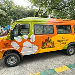 Our "Pup Express" is ready to roll. This colorful, custom-fitted van is the first of its kind, designed for safe and happy dog transport.