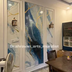 This blue and white abstract mural is another take on the granite style, created within decorative wall panels. The gold accents catch the light, adding a touch of warmth to the cool tones.