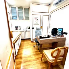 A view of my consultation room, where your journey to healthier skin begins. It is a private, professional space where we can discuss your concerns and I can conduct a thorough examination to create your personalized treatment plan.
