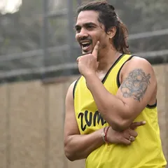 Our lead instructor, Aryan, engages with the crowd during an outdoor Zumba session. His energy and enthusiasm are key to making our corporate wellness events a success.