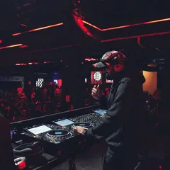 A Saturday night at the Darkroom Festival. The red glow of the club and the crowd in front of me is the perfect setting.