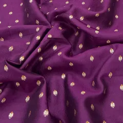 A stunning purple Banarasi brocade with gold butti work. This fabric has a rich texture and regal feel, perfect for crafting a statement blouse, lehenga, or a classic saree.