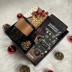 A closer look at our "Cozy at Home" Christmas hamper, beautifully arranged in a sleek black box with festive accents.