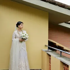 Draping this ethereal Sabyasachi creation for a beautiful bride. My focus was on creating a clean, sophisticated silhouette that allowed the delicate lacework and embroidery of the wedding saree to shine through.