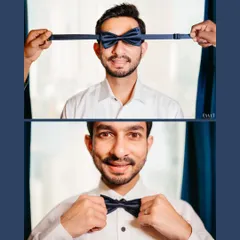 The playful side of getting ready. A fun shot with the bow tie before it's perfectly placed.