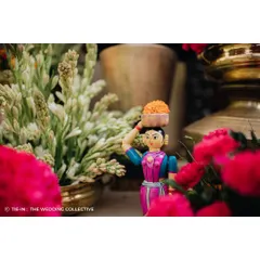 We added a playful touch to this traditional Haldi setup with colourful Channapatna toys. This detail not only adds a pop of colour but also celebrates local culture and craftsmanship, making the decor more meaningful.