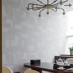 This subtle, abstract wallpaper was also designed for a professional setting. The light grey, tone-on-tone geometric pattern adds texture and interest to the meeting room without being distracting.