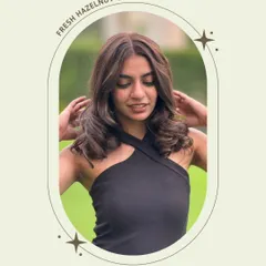 A closer look at the soft curls and chocolatey tones of this hazelnut color. It’s a luxe, trendy look that enhances the client's natural beauty.