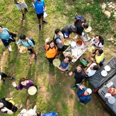 A great ride deserves great food. We believe in celebrating the journey with well-earned breaks, like this scenic picnic set up by our support crew. It's these moments of rest and camaraderie that make our tours special.