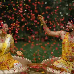 The pure, unscripted joy of a Haldi ceremony. I let these moments unfold naturally, capturing the laughter, the shower of petals, and the vibrant energy that makes your celebration uniquely yours.