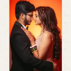 An intimate close-up of the couple during their reception. The warm lighting and their gentle embrace create a feeling of love and connection. This is the kind of candid portrait I strive for.