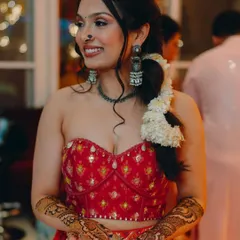 A mehendi function calls for a fun and vibrant look. I gave this bride-to-be a fresh, glowing base, defined eyes, and a joyful lip color that matched the festive energy of her red lehenga. The look was designed to be comfortable and long-lasting for the entire event.