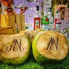 It's the small details that make a big impact. I offer custom engraved coconuts with your wedding monogram, serving as a unique and refreshing welcome drink for your guests at your destination wedding or daytime event.