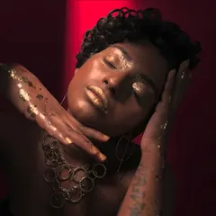 A powerful editorial look focusing on texture. I used gold glitter and foil on the eyes and lips to create a molten, high-impact effect that catches the light beautifully, perfect for a dramatic beauty story.