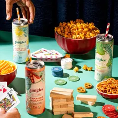 We create entire worlds around a product. This lifestyle shoot for Junglee's canned cocktails was designed to feel like a real game night with friends, showing the drinks as a natural part of a fun, social experience.