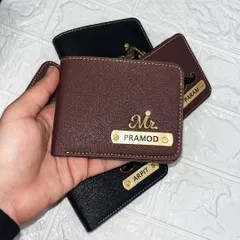 A closer look at my premium personalized wallets for men. Each wallet is customized with a nameplate and a unique charm, like the "Mr." title or a mustache icon, making it a perfect gift for him.