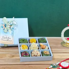 A close-up of my 'Rakhi ki Mitaas' box, showcasing the intricate, natural details of each piece. You can see the quality of the Peshawari pistachios, walnuts, and almonds used to create these healthy treats.