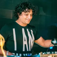 A candid shot while I'm focused on the music. My love for music is what drives every single performance, whether it's for a small private party or a huge festival.