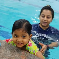 It's never too early to love the water. I create a safe and joyful space for our tiniest swimmers, like this little one, in our parent-and-toddler classes.