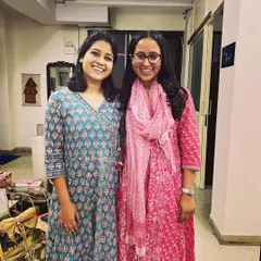 My mom and me at the studio. Though we've paused in-person classes for now due to travel, we're excited to focus more on our online workshops.
