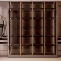 A close-up of the bespoke crockery unit, featuring fluted glass doors and internal lighting. This piece demonstrates my commitment to detailed craftsmanship and creating custom furniture that elevates the space.