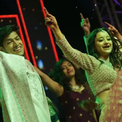 A beautiful shot of the couple sharing a dance during their Sangeet. These choreographed moments are designed to tell their story, creating a centerpiece for the evening's performances.