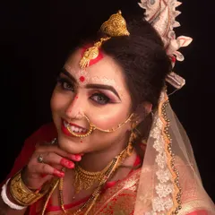 A beautiful portrait of a traditional Bengali bride. We have experience capturing the unique details of various Indian cultures, including the distinctive 'mukut' and intricate makeup of a Bengali wedding.