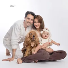 This is easily one of our favorite family "pawtrait" sessions. Capturing the love between parents, their new baby, and their beloved dog was so special.