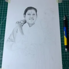 This A3 sketch of a mother and daughter was a commission from Maharashtra. It's a work-in-progress shot, showing how I build up the layers to create a touching family portrait.