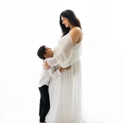 There's a special kind of glow that every mommy-to-be has. In the studio, we can create these elegant, classic portraits that celebrate this incredible time in your life, showing the beautiful bond you already share with your little one.