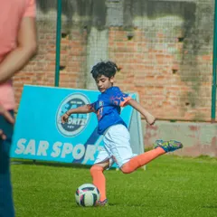 Samarth in action, demonstrating the powerful left foot strike that makes him a game changer on the field. His through passes are a key part of our team's attack.
