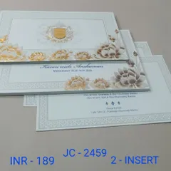 A sophisticated white invitation with a border of embossed lotus flowers in gold and bronze tones. The clean layout and premium finish make it perfect for a formal wedding.