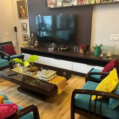 A closer look at the yellow macrame cushion cover and matching table runner in my client's home, perfectly placed on the coffee table.