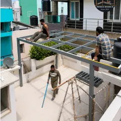 Our team's expertise and coordination are evident on site. We work efficiently and cleanly to erect the pergola framework, demonstrating the strength and stability of the structure even before the roof is installed.