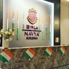 The reception desk at Birla Navya Gurugram decorated for Independence Day. We used hanging tricolour streamers and kite-shaped flags to create a festive look that complements the company's branding.