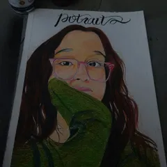This is a stylized portrait I drew with colored pencils. It's a great option if you want a more relaxed and artistic interpretation rather than a photorealistic drawing.