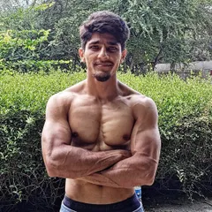 Another shot emphasizing the core and upper body physique that is a direct result of our holistic training methods.