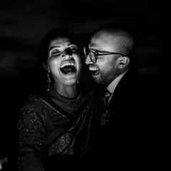 Vampires are real. Or at least, we can pretend. This was a spontaneous idea using a single light source near the pool. Amrutha and Ashwin's huge laugh after the "scary" pose is what makes this shot gold.