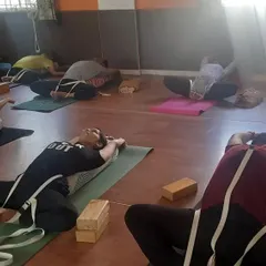 In my restorative yoga classes, we use props like straps and blocks to support the body in gentle, healing postures. This approach makes deep relaxation accessible to everyone, regardless of flexibility, and is ideal for managing stress and anxiety.