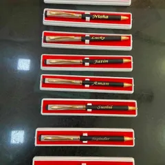 A batch of personalized pens ready for Teacher's Day. Engraving names on pens is a simple yet effective way to show appreciation in bulk.
