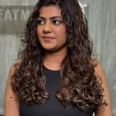 Another angle of these magical curls. The color placement is designed to make each curl pop, creating a vibrant and dynamic look.