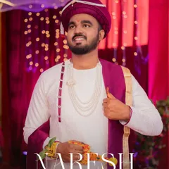 A classic portrait of the groom, Naresh, looking regal in his Maharashtrian wedding outfit.