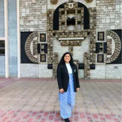 A photo taken outside a court building, dressed in my professional attire. Each day as an advocate brings new challenges and opportunities to stand up for what is right.