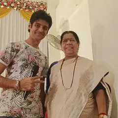 A picture with Mhanda Taai Mhatre, MLA of Belapur, after hosting her brother's wedding anniversary. I have the experience and professionalism to host events for political figures and other VIPs.