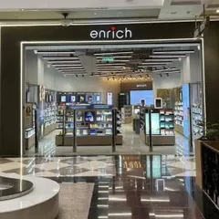 The storefront we designed and executed for Enrich, a major salon and beauty brand. A strong facade is crucial for retail, and we focused on creating an inviting, premium entrance with clear branding and excellent lighting that draws customers in.