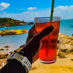 Relaxing with a cool drink by the sea in Gokarna. Our itineraries are perfectly balanced with adventure and leisure time.