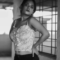 The black and white version of the previous shot. This edit emphasizes the contrast and texture, creating a more dramatic and moody portrait.