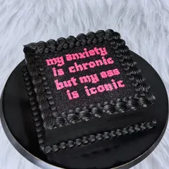 This is for everyone who knows their worth. A black buttercream cake with glittery pink text that says it all: "my anxiety is chronic but my ass is iconic". Let's celebrate you, your confidence, and your iconic self with a cake that's just as bold.